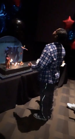 Travis scott blowing out his birthday candles