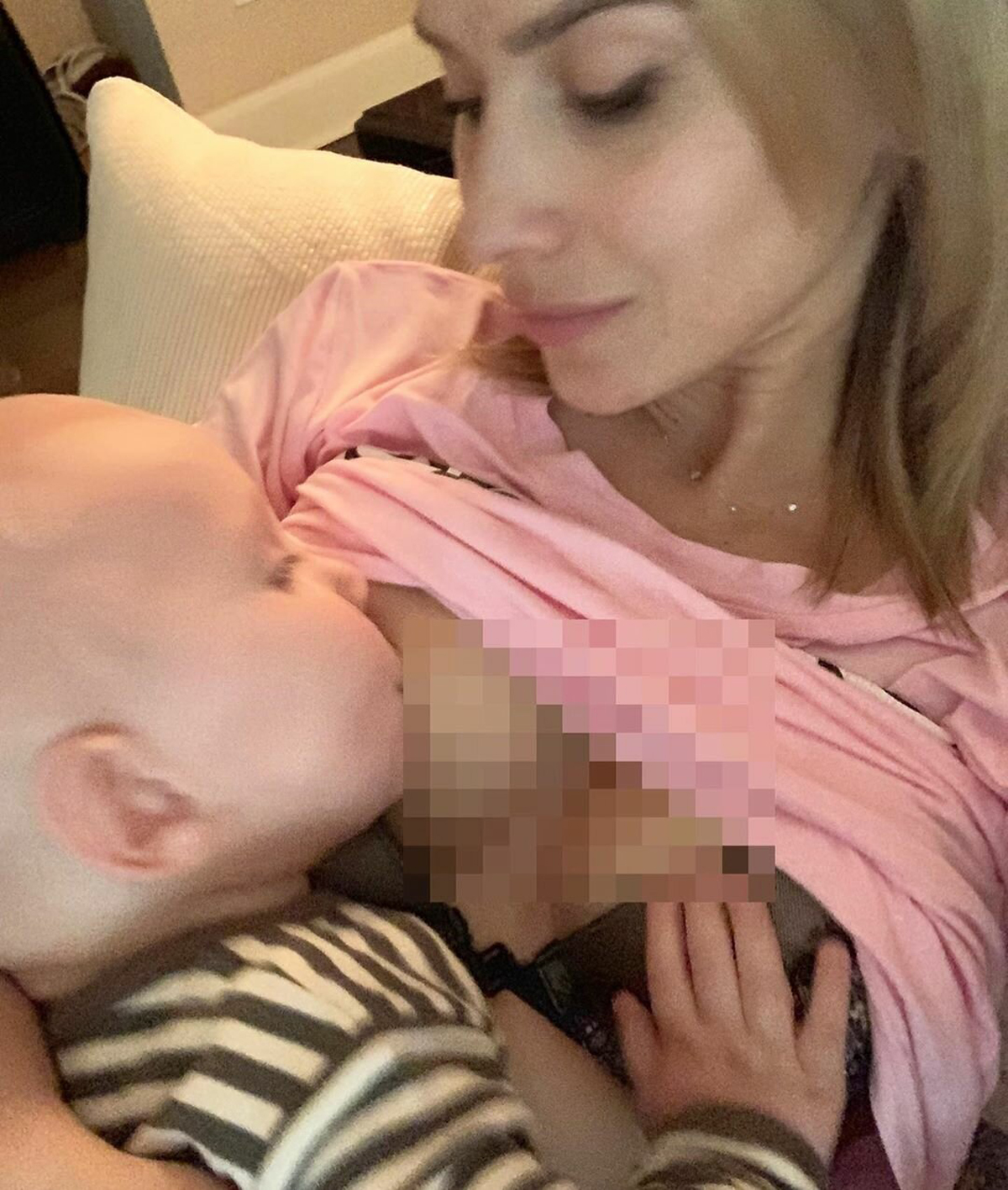 Hilaria Baldwin shows off side-boob as she bends over backwards to kiss her  baby girl