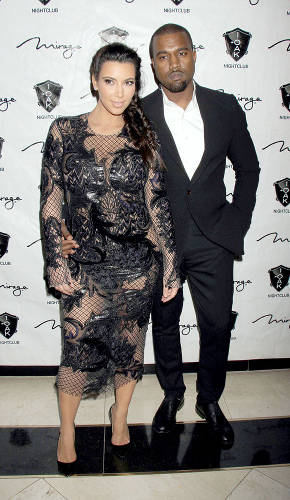 Kim and Kanye celebrating New Year's Eve at 1 Oak Nightclub at The Mirage Resort and Casino in Las Vegas.
