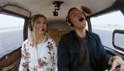 Hannah and Peter taking a private flight