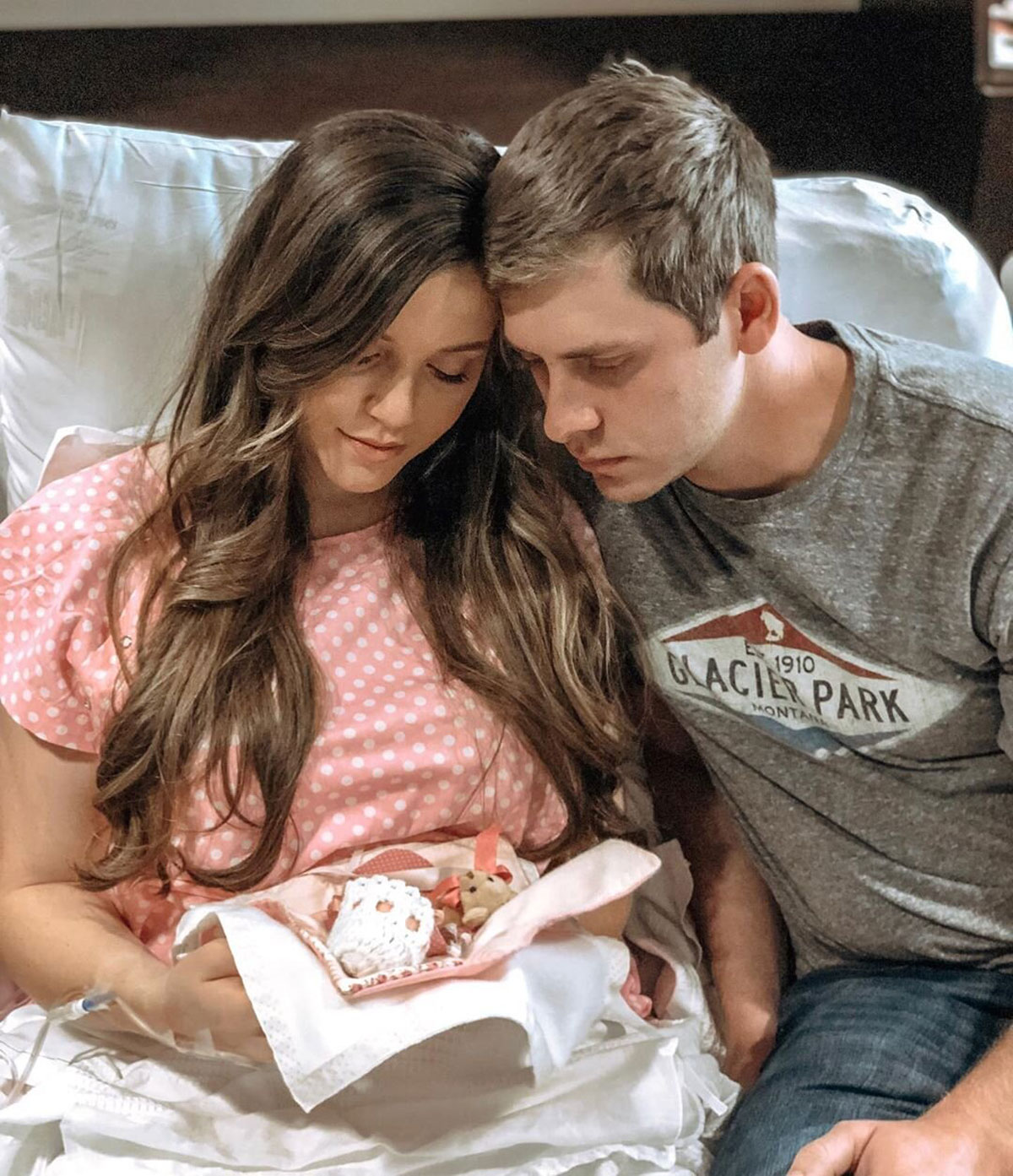 Joy-Anna Duggar cradles her stillborn baby.