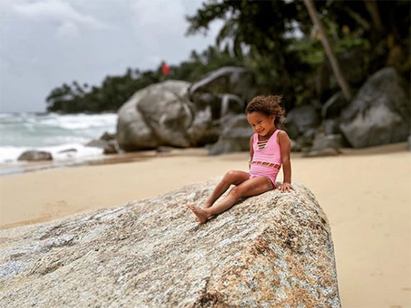 Luna Simone Stephens posing on the beach.
