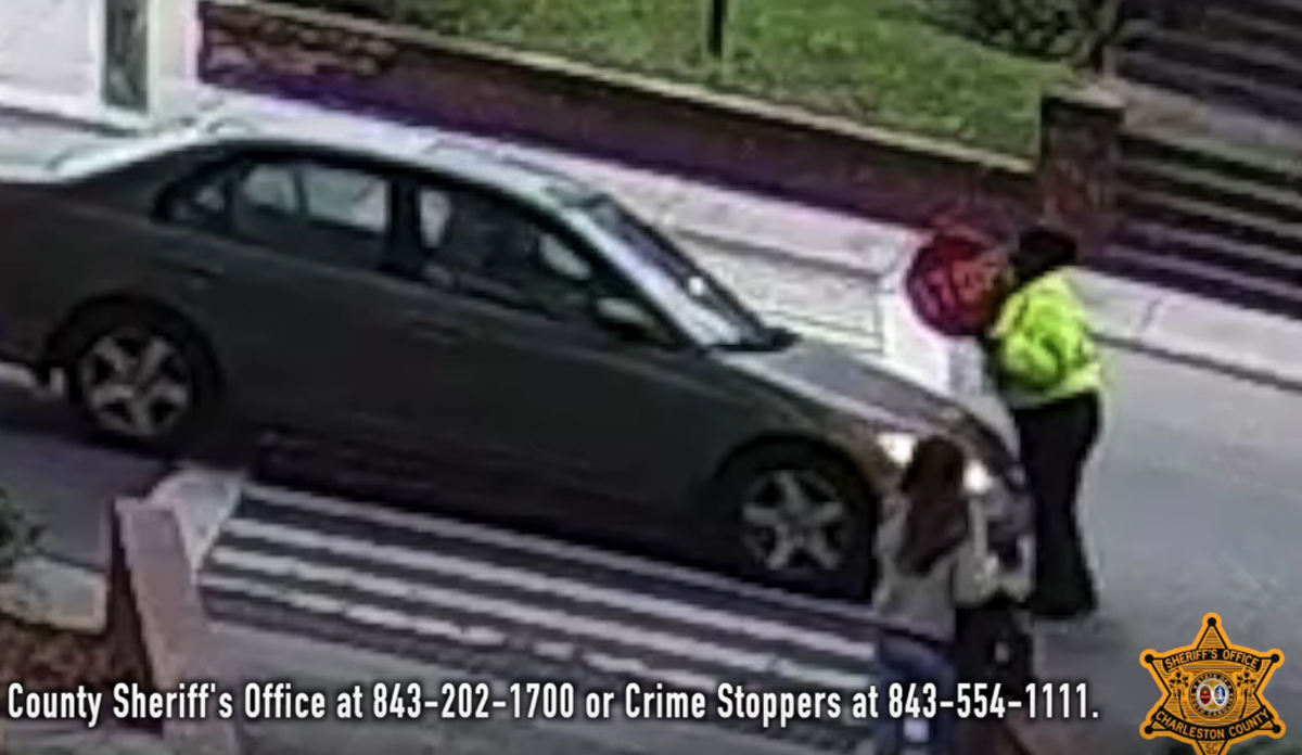 Crossing officer injured by car