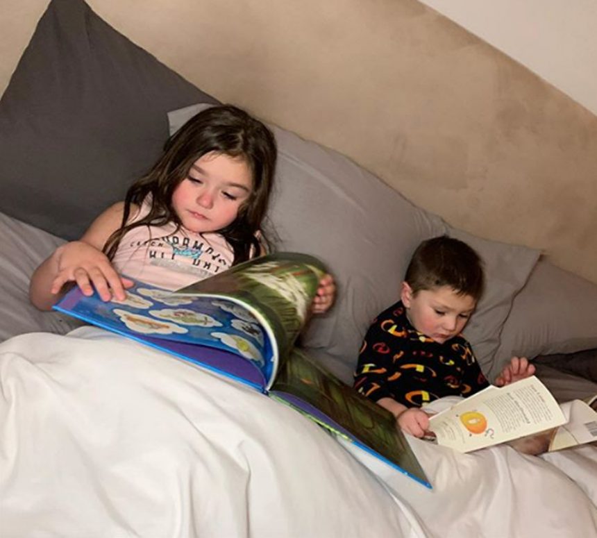 JWoww Greyson Meilani reading in bed