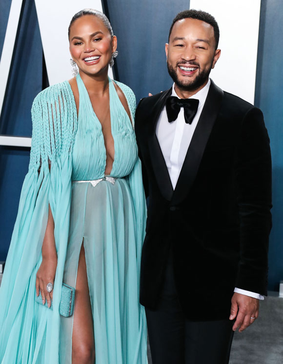 Chrissy Teigen and John Legend actively support each other's goals.