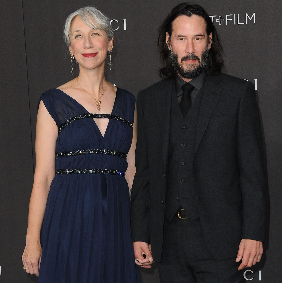 keanu reeves poses with girlfriend alexandra grant