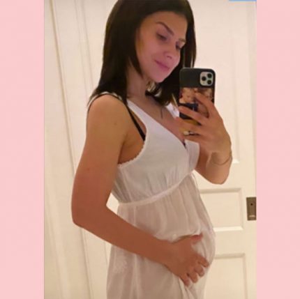 Hilaria Baldwin shows off her growing baby bump.