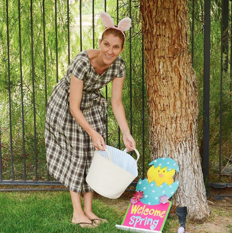 Celine Dion hunts for Easter eggs in a checkered dress