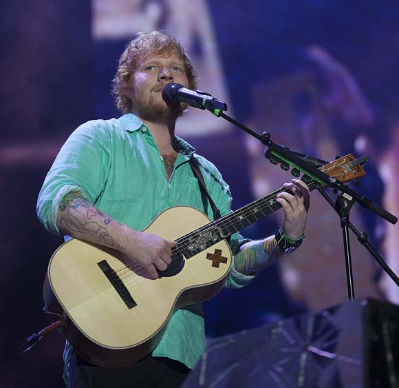 Ed Sheeran opens up about binge eating and drinking during his 2015 world tour.