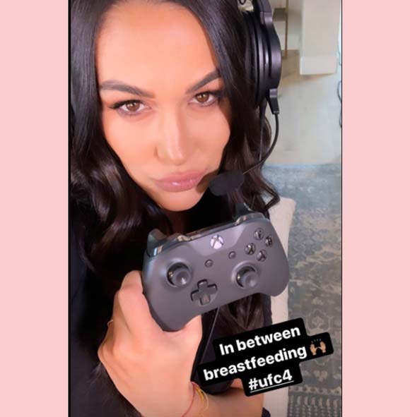 Nikki Bella says she breastfeeds between video games.