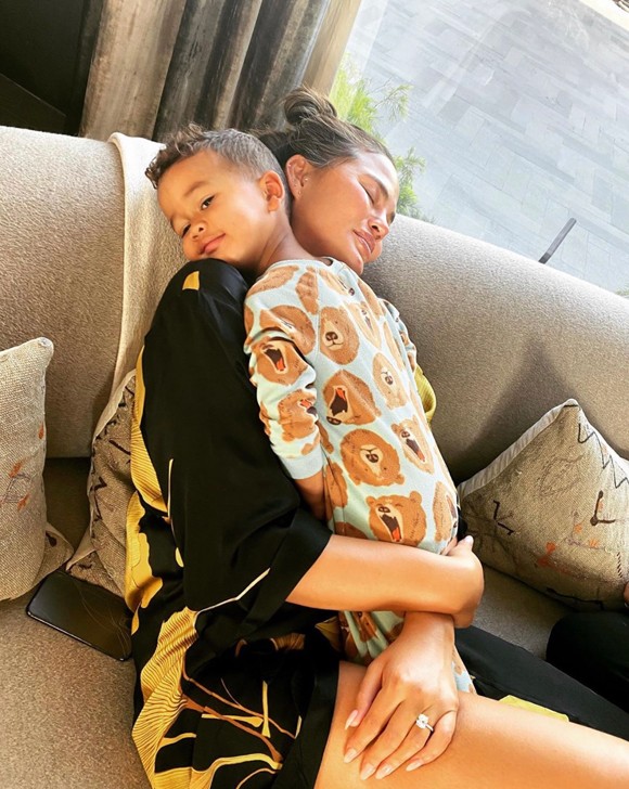 Chrissy Teigen enjoying a hug from her son Miles.