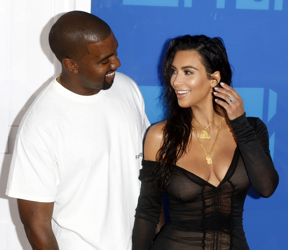 Kim Kardashian defends Kanye West's frequent and frivolous use of private planes.