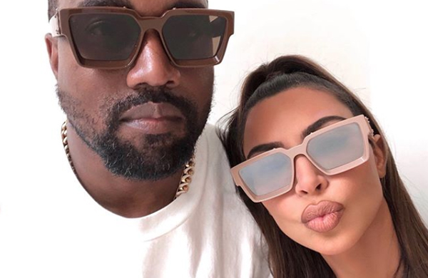 Kim Kardashian initially defends Kanye West's alarming Twitter rants.