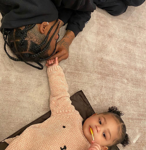 Travis Scott hanging with his daughter Stormi Webster.