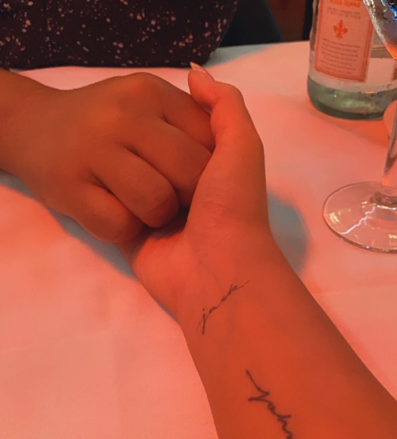 Chrissy Teigen tattoos her unborn son Jack's name on her wrist.