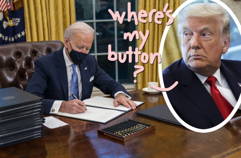 trumps red button on desk