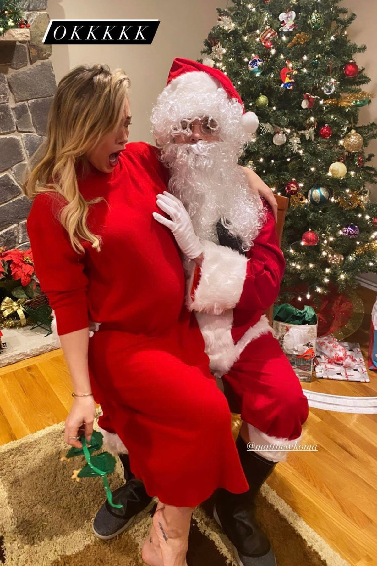 Hilary Duff's Santa cops a feel