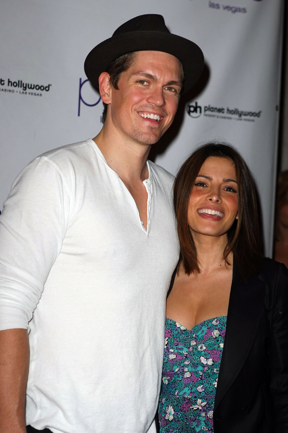 Steve Howey and Sarah Shahi celebrating their engagement in 2009