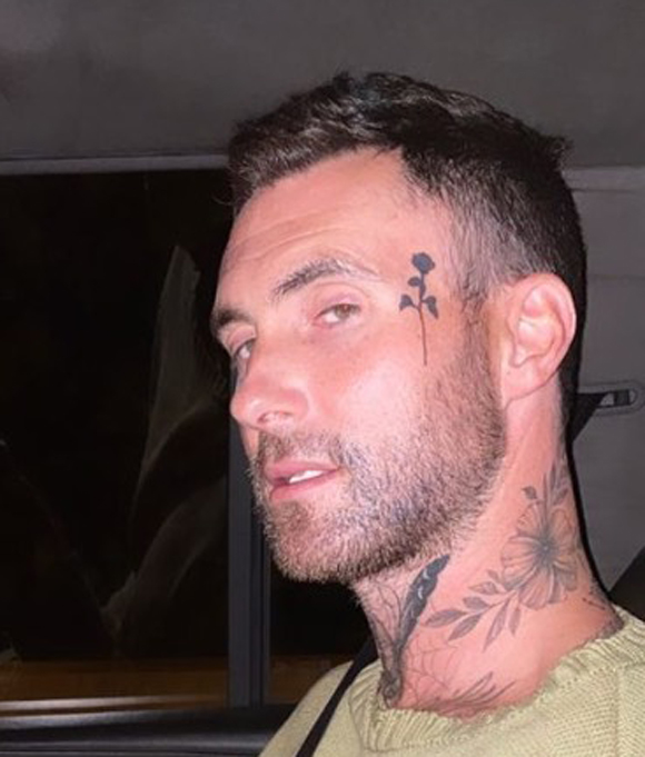 Adam Levine face tattoo closeup