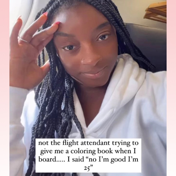 simone biles mistaken on flight for a child