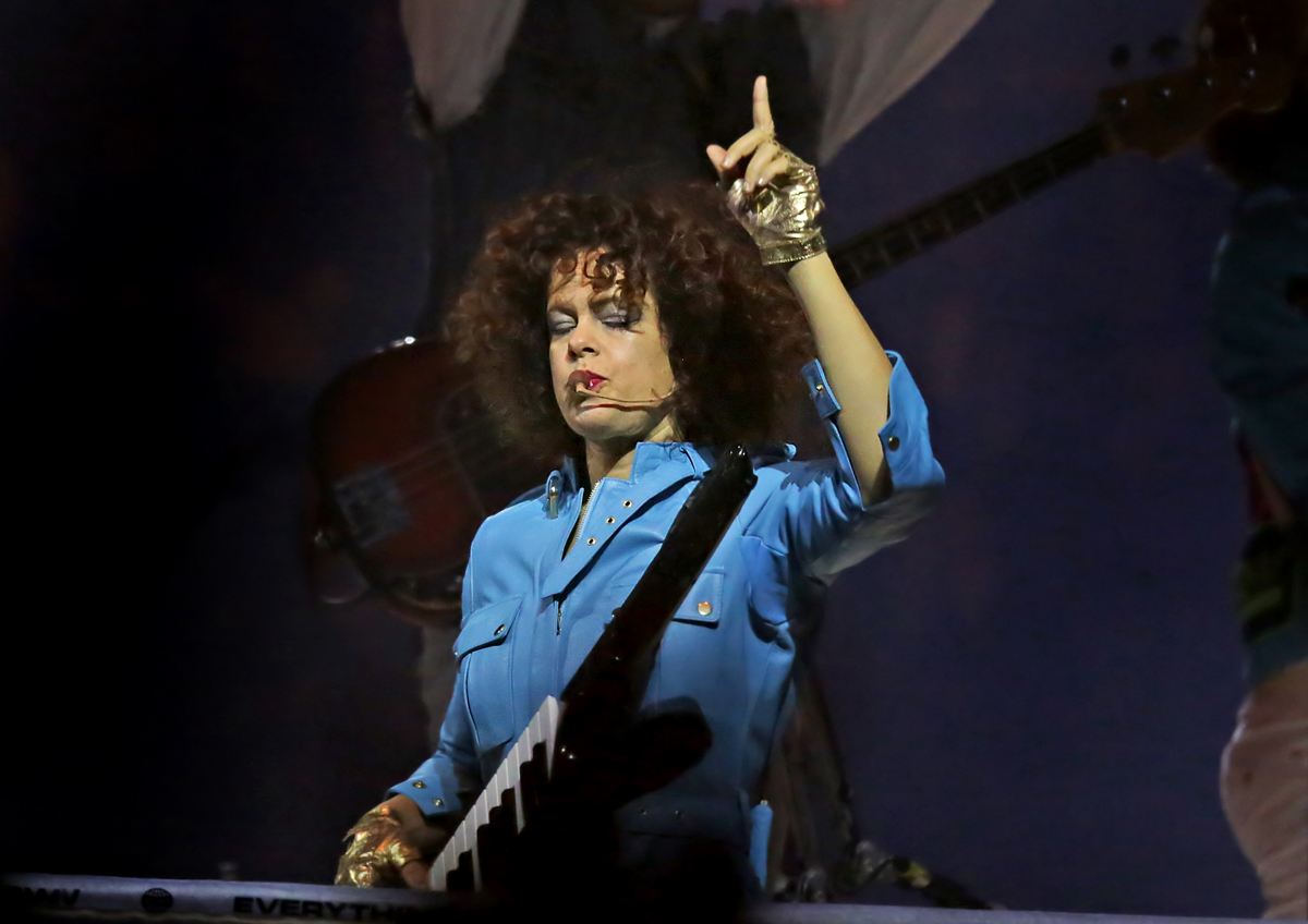 Regine Chassagne performing with Arcade Fire