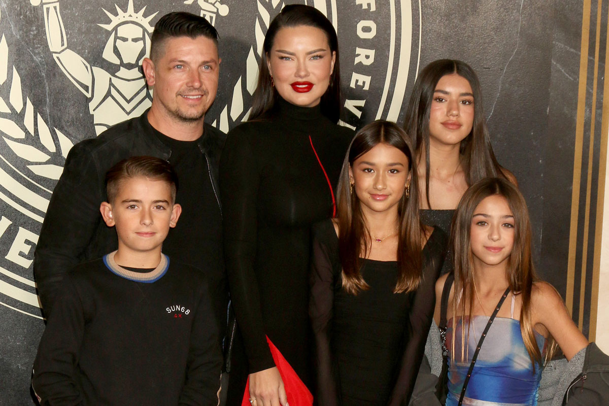 Adriana Lima Brings Family To Hunger Games Red Carpet