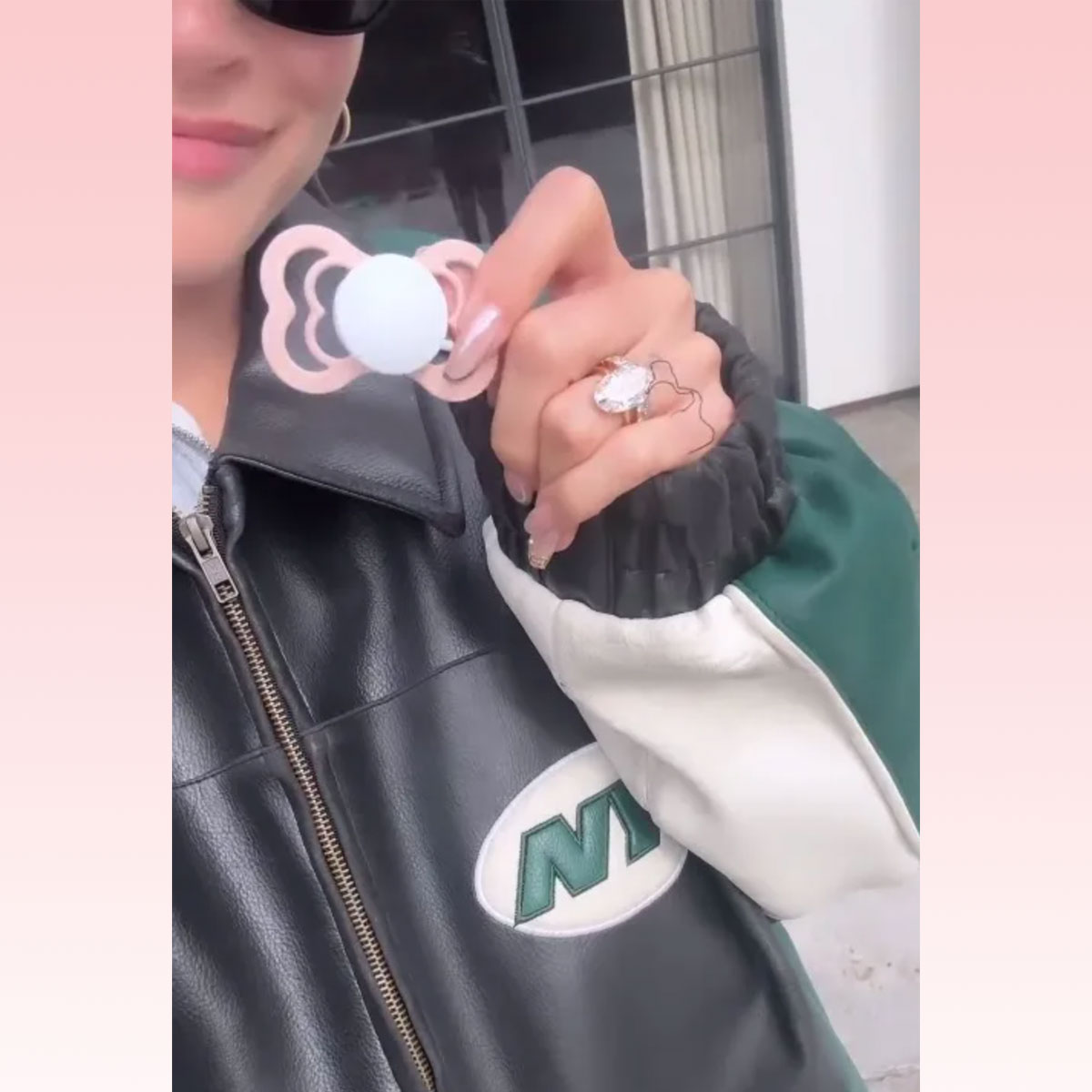 Hailey Bieber Hold Pink Pacifier