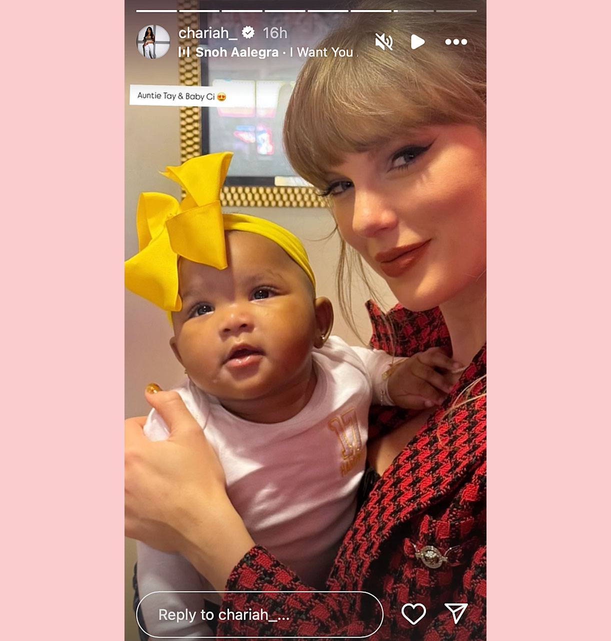 Taylor Swift holding Chariah Gordon's daughter Ci