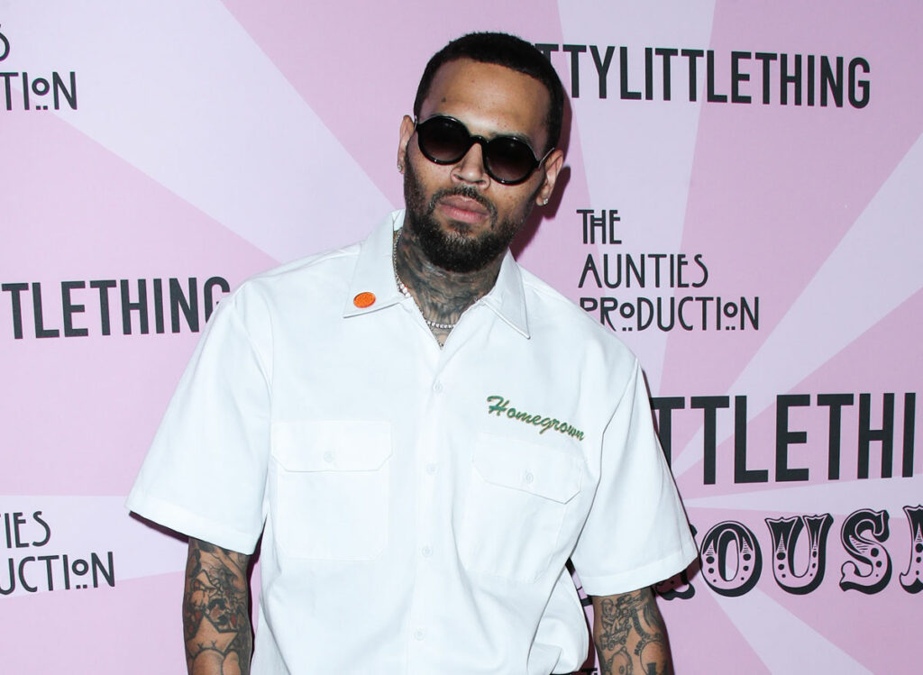 Chris Brown Arrested For Allegedly Attacking A Music Producer With A Tequila Bottle At London Club!