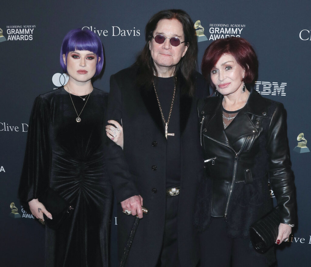 Kelly Osbourne hugs dad Ozzy