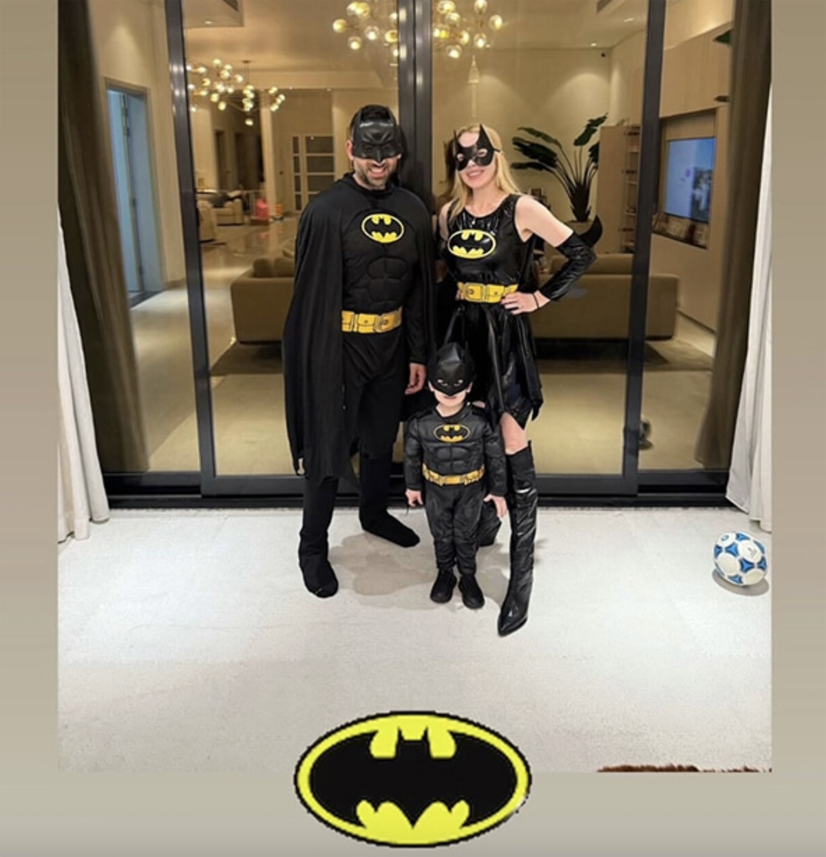 Lindsay Lohan with husband and son as Batman for Halloween