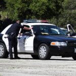 Texas Man Arrested Amid Investigation Into Woman's Suspicious Death Snaps Mugshot In UNBELIEVABLE Hoodie