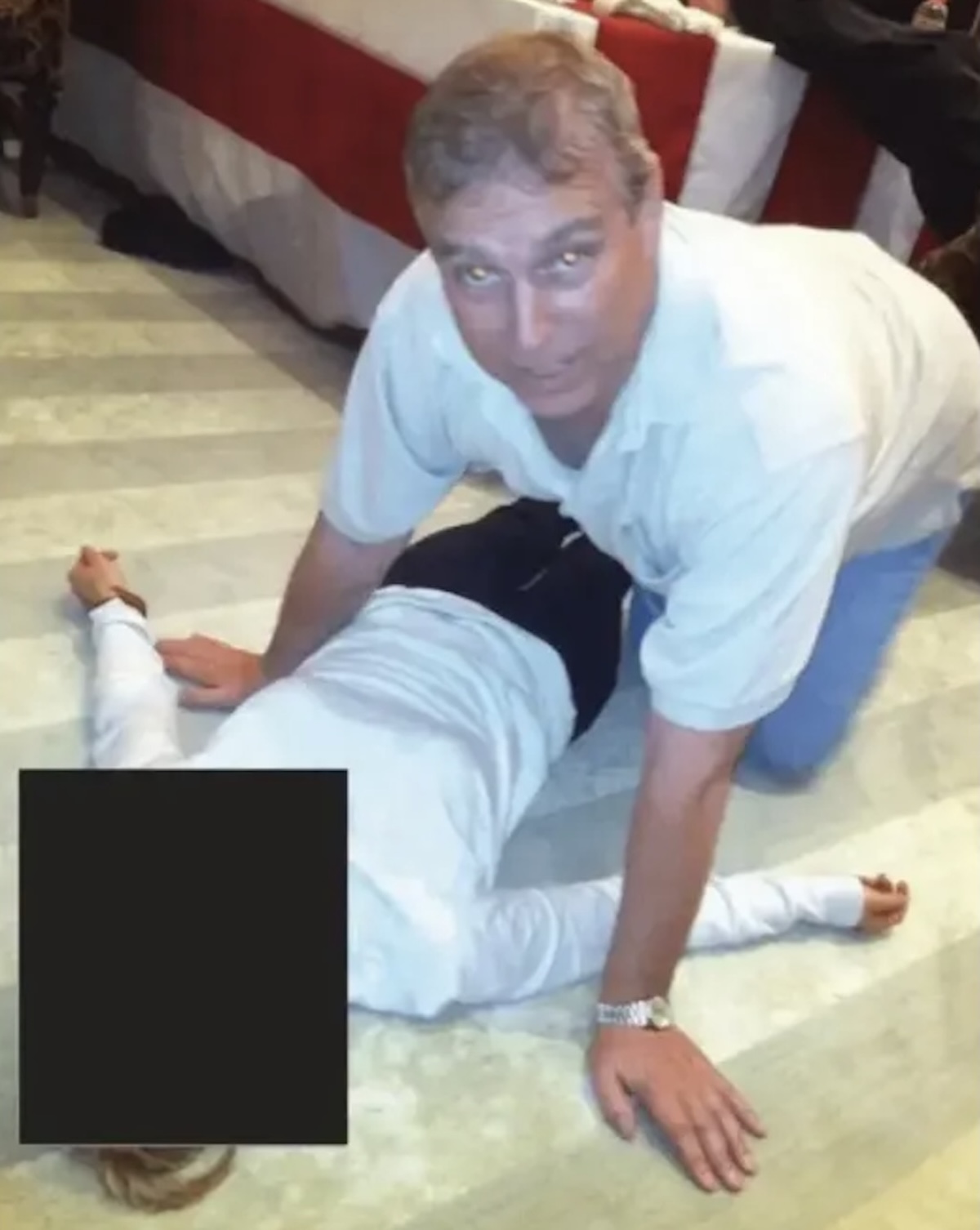 Ex-Prince Andrew Seen On All Fours Hovering Over Unidentified Woman In Jarring New Epstein Files Photo