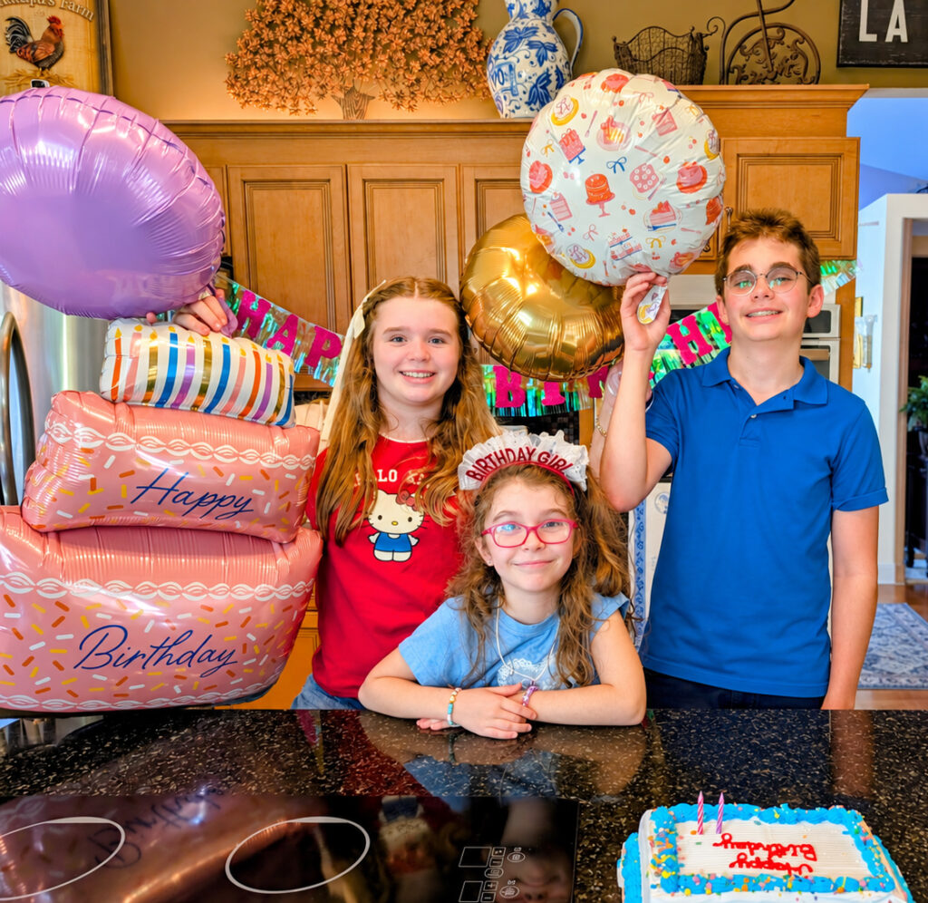 Mayte celebrates her ninth birthday with her siblings, Mario and Mia.
